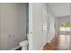 Bright powder room featuring a toilet and pedestal sink at 225 Final Stretch Ln, Clover, SC 29710
