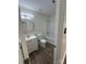 Bright bathroom featuring a vanity, toilet, and shower/tub combo at 2303 Hope Valley Ln, Charlotte, NC 28213