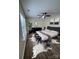 Stylishly furnished bedroom with a plush bed, modern decor, and ample natural light at 2303 Hope Valley Ln, Charlotte, NC 28213