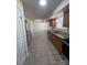 Well-equipped kitchen featuring tile floors, stainless steel appliances, and ample storage at 2303 Hope Valley Ln, Charlotte, NC 28213
