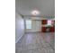 Eat-in kitchen with natural light, a rear door, and stainless appliances at 2303 Hope Valley Ln, Charlotte, NC 28213