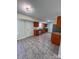 Bright kitchen features stainless steel appliances, tile floors and ample cabinet space at 2303 Hope Valley Ln, Charlotte, NC 28213