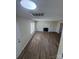 Bright and open living area with hardwood floors and cozy fireplace at 2303 Hope Valley Ln, Charlotte, NC 28213