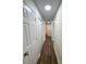 Bright hallway with updated flooring and neutral paint, offering a clean and modern feel at 2307 Hope Valley Ln, Charlotte, NC 28213