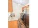 Cozy kitchen featuring stainless steel appliances, granite countertops and modern lighting at 2307 Hope Valley Ln, Charlotte, NC 28213