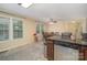 Well-lit dining area adjacent to the kitchen, featuring a dining table and hardwood floors at 2325 Seymore Ave, Albemarle, NC 28001