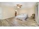 Bright and airy main bedroom with hardwood floors and a neutral color scheme at 2325 Seymore Ave, Albemarle, NC 28001