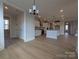 Large living room with hardwood floors and view of the kitchen at 251 Luray Way # 441, Rock Hill, SC 29730