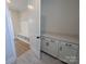 Mudroom with storage bench and coat hooks adjacent to built-in cabinets and countertop space at 251 Luray Way # 441, Rock Hill, SC 29730