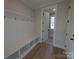 Bright mudroom features coat hooks, bench with storage, and neutral paint, offering practical space at 251 Luray Way # 441, Rock Hill, SC 29730