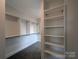 Walk-in closet with custom shelving, providing ample storage space for organization at 251 Luray Way # 441, Rock Hill, SC 29730