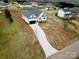 Aerial view of a modern home with a long driveway and expansive lot at 2705 Eagle Dr, Lincolnton, NC 28092
