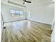 Spacious bedroom with wood floors, large windows, and plenty of natural light at 2705 Eagle Dr, Lincolnton, NC 28092