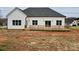 Exterior back view of a home with a wood deck, windows, and vinyl siding at 2705 Eagle Dr, Lincolnton, NC 28092