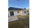 Backyard featuring concrete patio and vinyl siding at 3121 Strong Box Ln, Gastonia, NC 28052