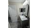 Bathroom featuring granite countertop vanity, a sink, mirror and installed lighting at 3121 Strong Box Ln, Gastonia, NC 28052