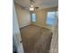 Bedroom featuring neutral walls, carpeted floor, installed ceiling fan, and two windows at 3121 Strong Box Ln, Gastonia, NC 28052