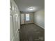 Bedroom is bright, with a window, carpeted floor and neutral walls at 3121 Strong Box Ln, Gastonia, NC 28052