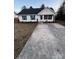 Charming single-story home features a well-maintained lawn and a concrete driveway at 3121 Strong Box Ln, Gastonia, NC 28052