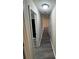 Hallway featuring wood floors and view to other rooms at 3121 Strong Box Ln, Gastonia, NC 28052