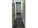 Hallway has consistent flooring, neutral paint, and access to other rooms at 3121 Strong Box Ln, Gastonia, NC 28052