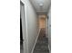 Hallway with hard surface floors with visible doors to rooms at 3121 Strong Box Ln, Gastonia, NC 28052