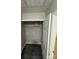 Laundry room featuring gray walls, wood floors and shelf storage at 3121 Strong Box Ln, Gastonia, NC 28052