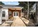 Wooden deck with cedar shake and french doors at 3507 Selway Dr # 14, Indian Trail, NC 28079