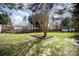 Expansive backyard featuring a well-maintained lawn, bordered by mature trees and a useful shed at 3507 Selway Dr # 14, Indian Trail, NC 28079