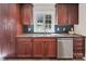 Kitchen features stainless steel appliances, wooden cabinets, and backsplash at 4501 Pine Valley Rd, Charlotte, NC 28210