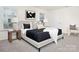 Bright bedroom features a minimalist design, neutral color palette, and plenty of natural light at 5156 Fireweed Ct, Dallas, NC 28034