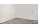 Neutral colored room with carpet, white walls, baseboards, and two doors at 5156 Fireweed Ct, Dallas, NC 28034