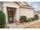 Inviting home entrance, features a decorative door and a well-maintained landscaped walkway at 526 Pine Links Dr, Tega Cay, SC 29708