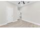 Bedroom featuring wood-look floors, closet, and neutral walls for a calming ambiance at 533 3Rd St, Chester, SC 29706