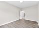 Open bedroom with light gray vinyl plank flooring at 533 3Rd St, Chester, SC 29706