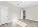 Bedroom featuring wood-look floors and ensuite access at 533 3Rd St, Chester, SC 29706