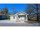 Charming home featuring a inviting front porch and well-manicured yard at 533 3Rd St, Chester, SC 29706