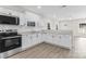 Modern kitchen features white cabinets, stainless steel appliances, and a breakfast bar at 533 3Rd St, Chester, SC 29706
