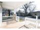 Inviting covered porch features stone columns and an eye-catching railing at 533 3Rd St, Chester, SC 29706