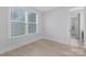 Inviting bedroom with light hardwood floors and sun-filled windows, creating a warm and airy atmosphere at 600 Campus St, Charlotte, NC 28216