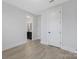 Spacious bedroom featuring wood floors and neutral walls at 600 Campus St, Charlotte, NC 28216
