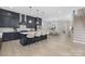 Open concept kitchen featuring navy cabinets, white quartz countertops, and stainless steel appliances at 600 Campus St, Charlotte, NC 28216