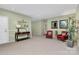 Inviting lobby area featuring armchairs, area rug, and decorative console table at 6006 Union Pacific Ave # 2B, Charlotte, NC 28210