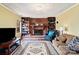 Cozy living room with fireplace and built-in bookshelves at 7210 Timber Ridge Dr, Mint Hill, NC 28227