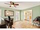 Spacious living room with tile flooring, large windows, and a neutral color palette at 7210 Timber Ridge Dr, Mint Hill, NC 28227