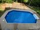Aerial view of an in-ground pool with adjacent deck, a great space for summer fun at 7210 Timber Ridge Dr, Mint Hill, NC 28227