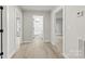 Hallway with white walls and doors leading to the bathroom and bedrooms at 723 Wood St, Statesville, NC 28677