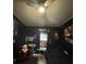 An eccentric bedroom with skateboards and posters decorating the walls at 8508 Colgate Cir, Charlotte, NC 28214