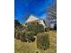 Charming home featuring a covered front porch with columns and mature landscaping adding curb appeal at 8508 Colgate Cir, Charlotte, NC 28214