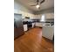 The kitchen features modern appliances, white cabinets, and a utility closet at 8508 Colgate Cir, Charlotte, NC 28214